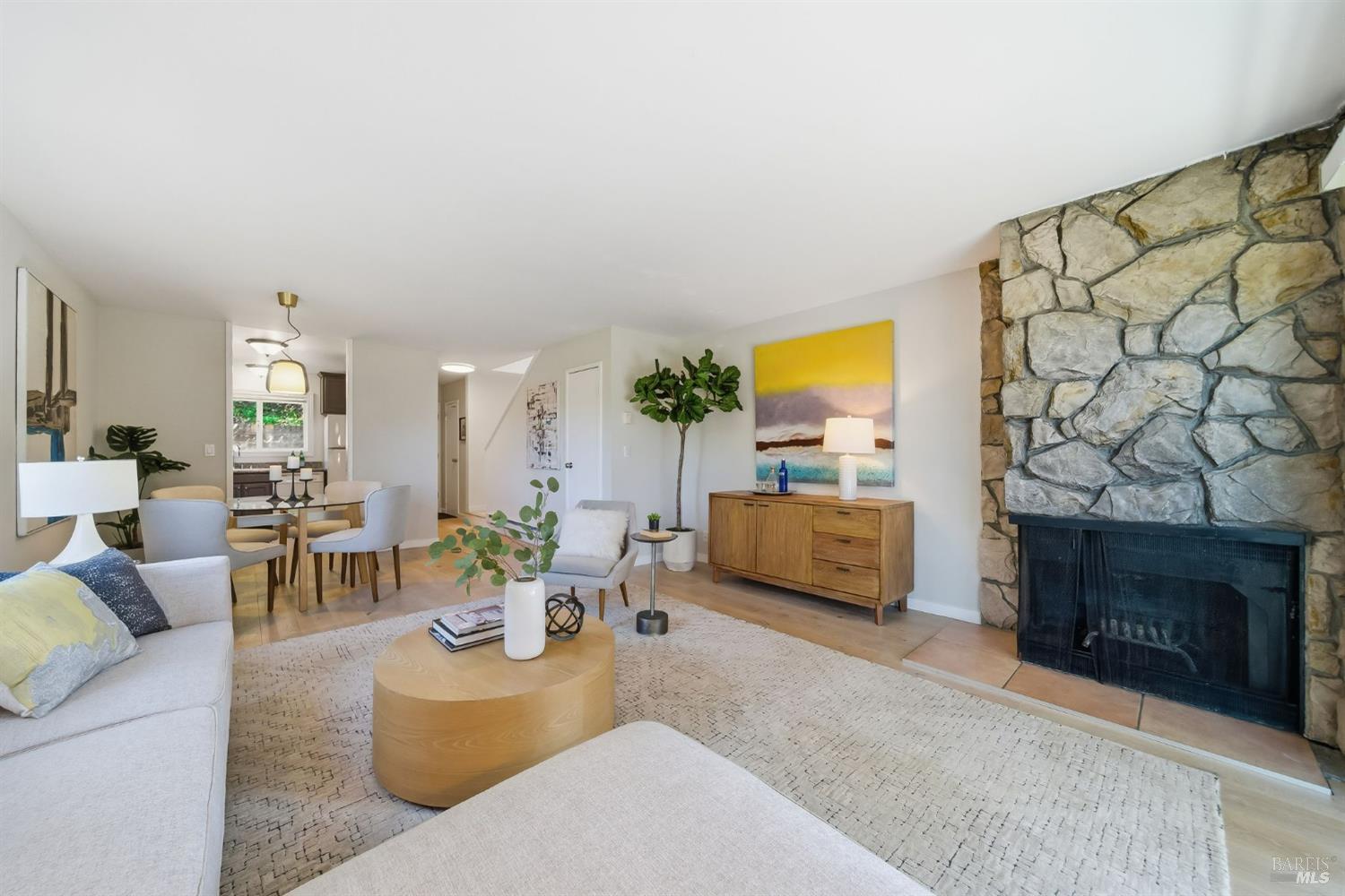 10 Professional Center Parkway, Unit 1 San Rafael, CA 94903 - Photo 8 of 35 a living room with furniture and a fireplace