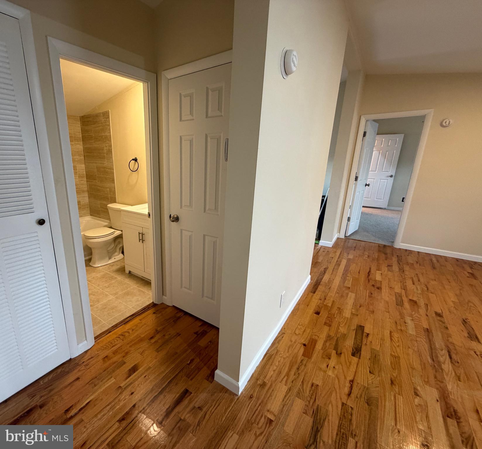 887 Aspen Avenue Spring City, PA 19475 - Photo 17 of 21 a view of a bathroom from a hallway