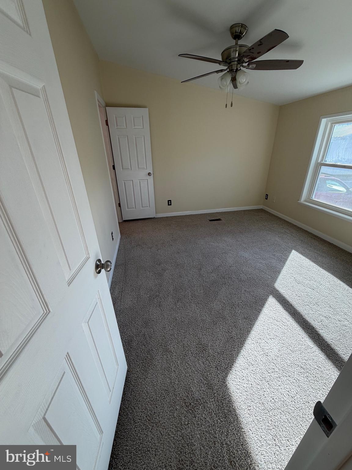 887 Aspen Avenue Spring City, PA 19475 - Photo 5 of 21 wooden floor in an empty room with a window