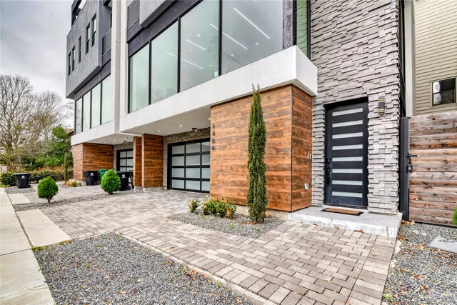 a view of a house with a street