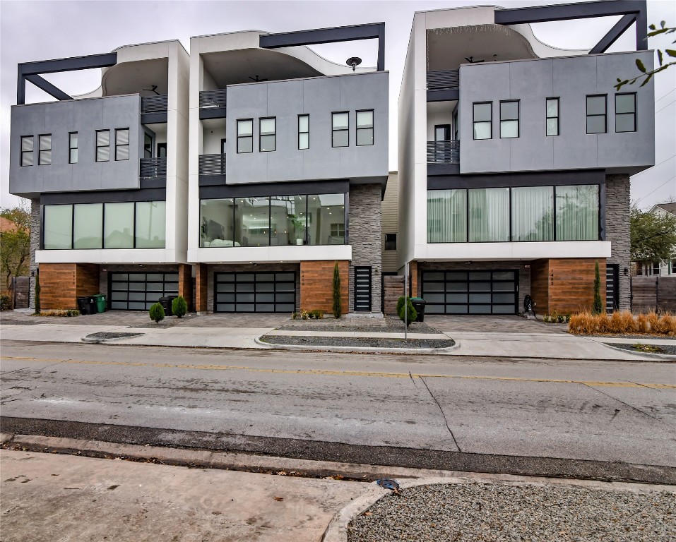 1406 Fairview Street Houston, TX 77006 - Photo 2 of 34 a view of a building with a street