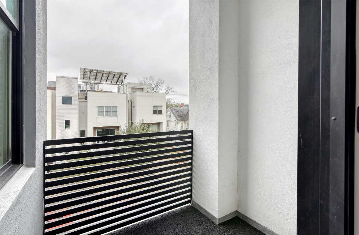 1406 Fairview Street Houston, TX 77006 - Photo 23 of 34 a view of a balcony with a door