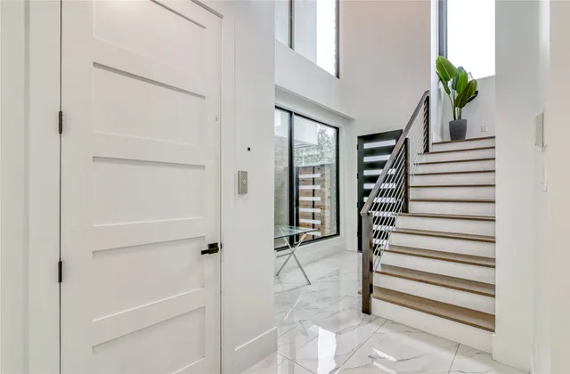 a view of entryway with wooden floor