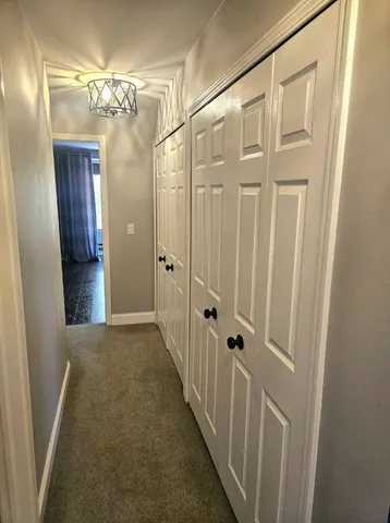 a bathroom with a sink a mirror and a toilet