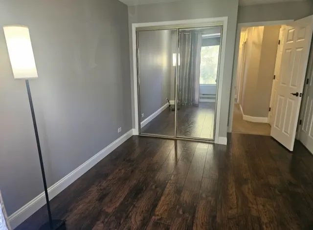 a view of a house with a tree