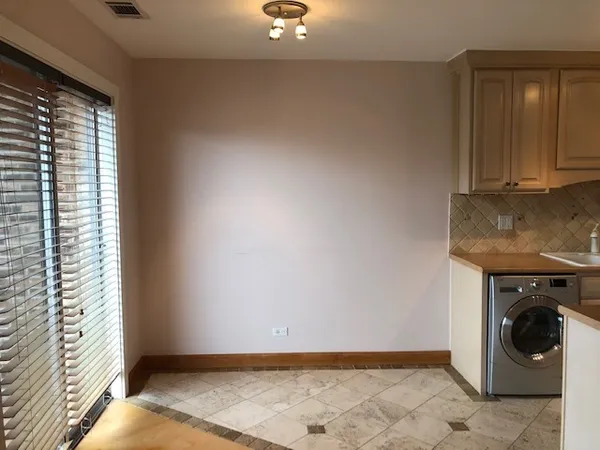 a view of a storage & utility room in a kitchen