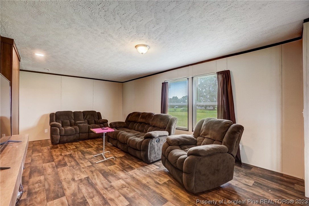 461 Reedsford Road Clinton, NC 28328 - Photo 7 of 27 a living room with furniture and a large window