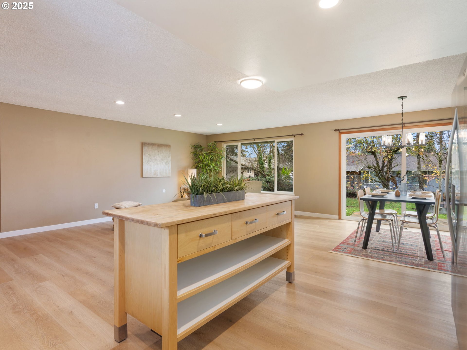 824 Southeast 207th Avenue Gresham, OR 97030 - Photo 19 of 47 a room with wooden floor and furniture