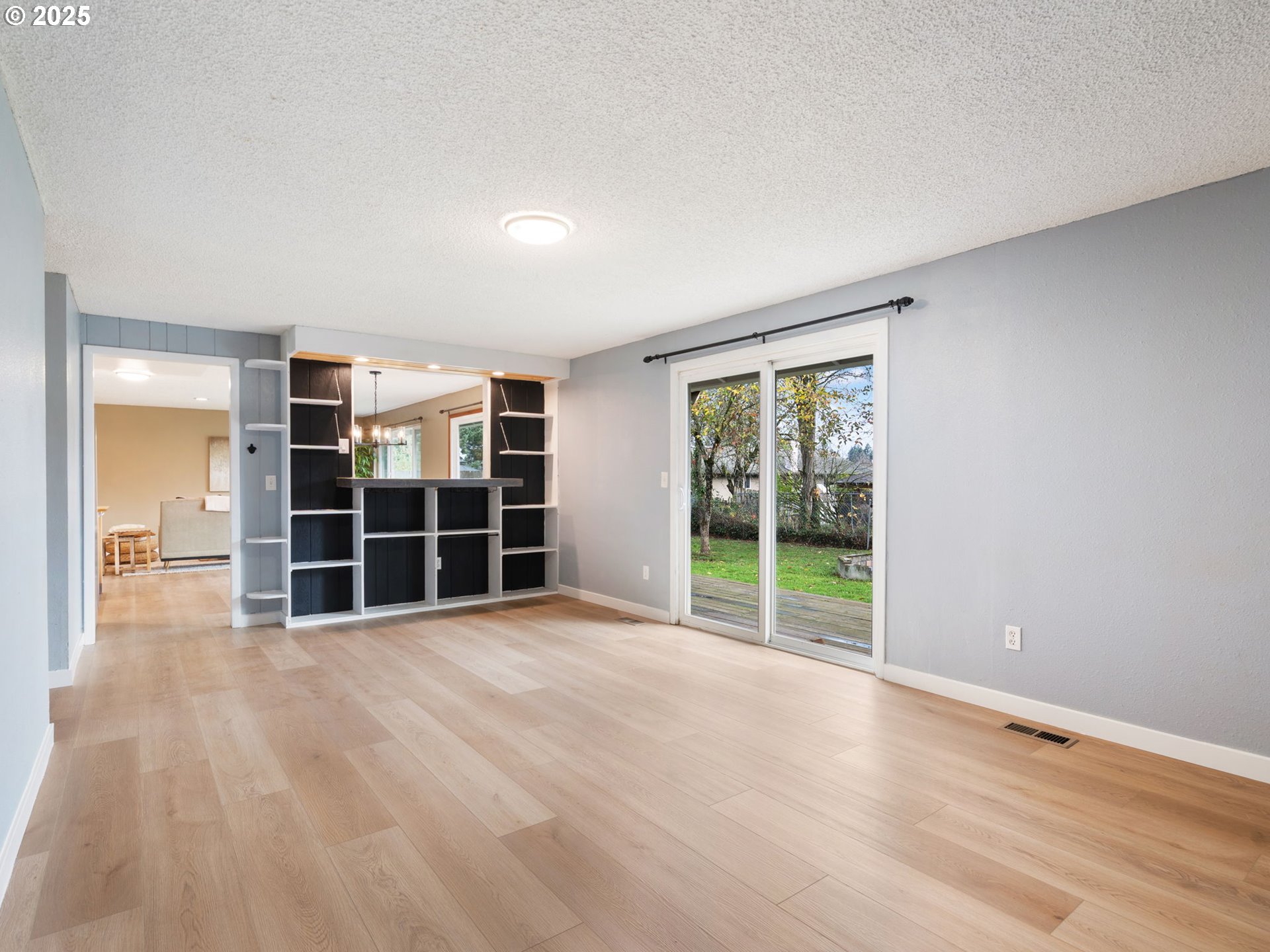 824 Southeast 207th Avenue Gresham, OR 97030 - Photo 22 of 47 wooden floor in an empty room with a window