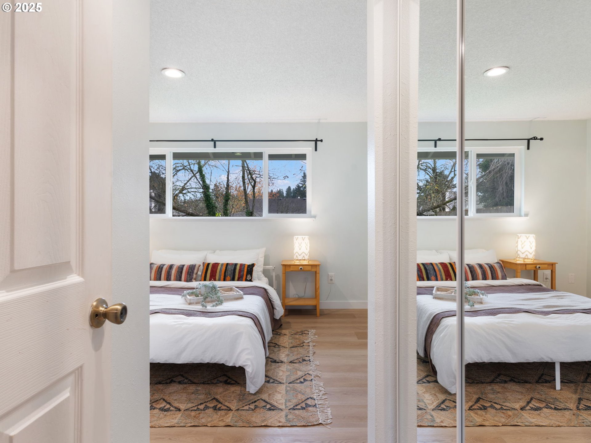 824 Southeast 207th Avenue Gresham, OR 97030 - Photo 24 of 47 a bedroom with furniture and a window
