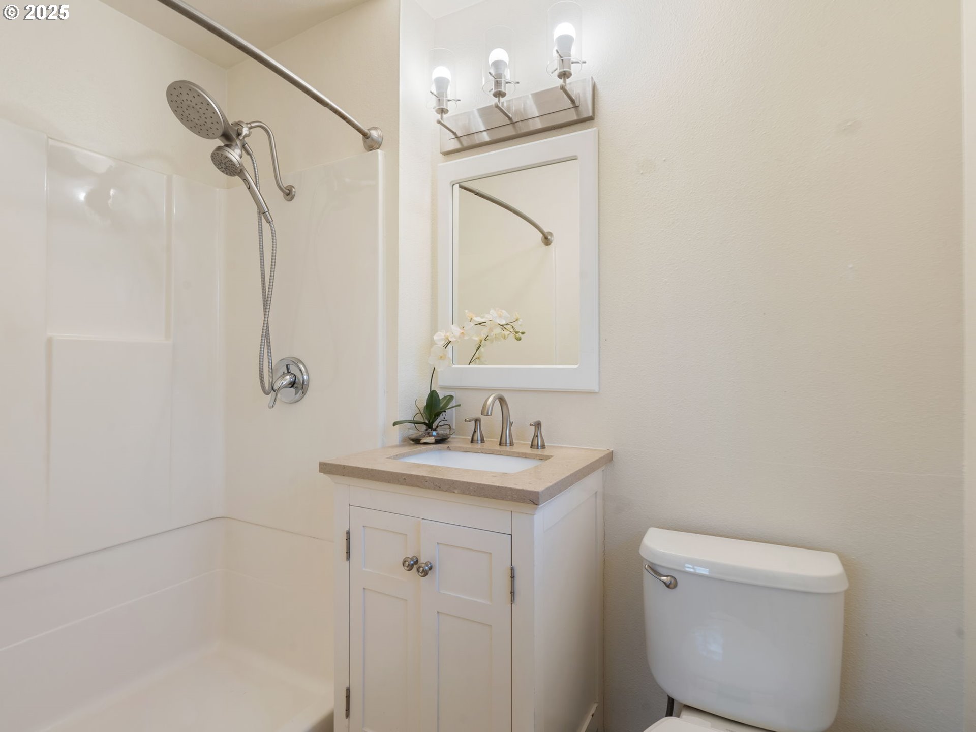 824 Southeast 207th Avenue Gresham, OR 97030 - Photo 28 of 47 a bathroom with a sink a toilet and shower