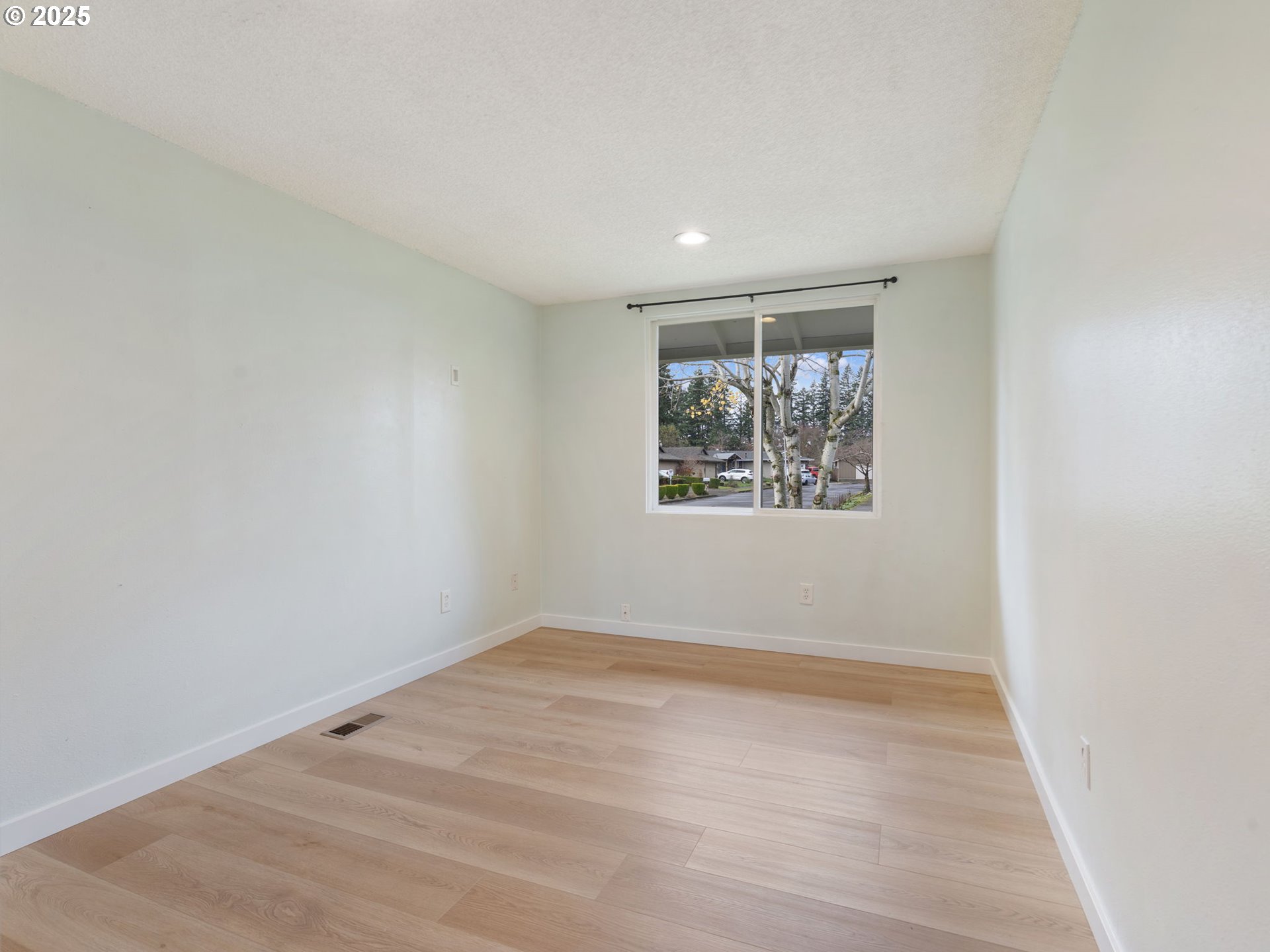 824 Southeast 207th Avenue Gresham, OR 97030 - Photo 30 of 47 an empty room with a window