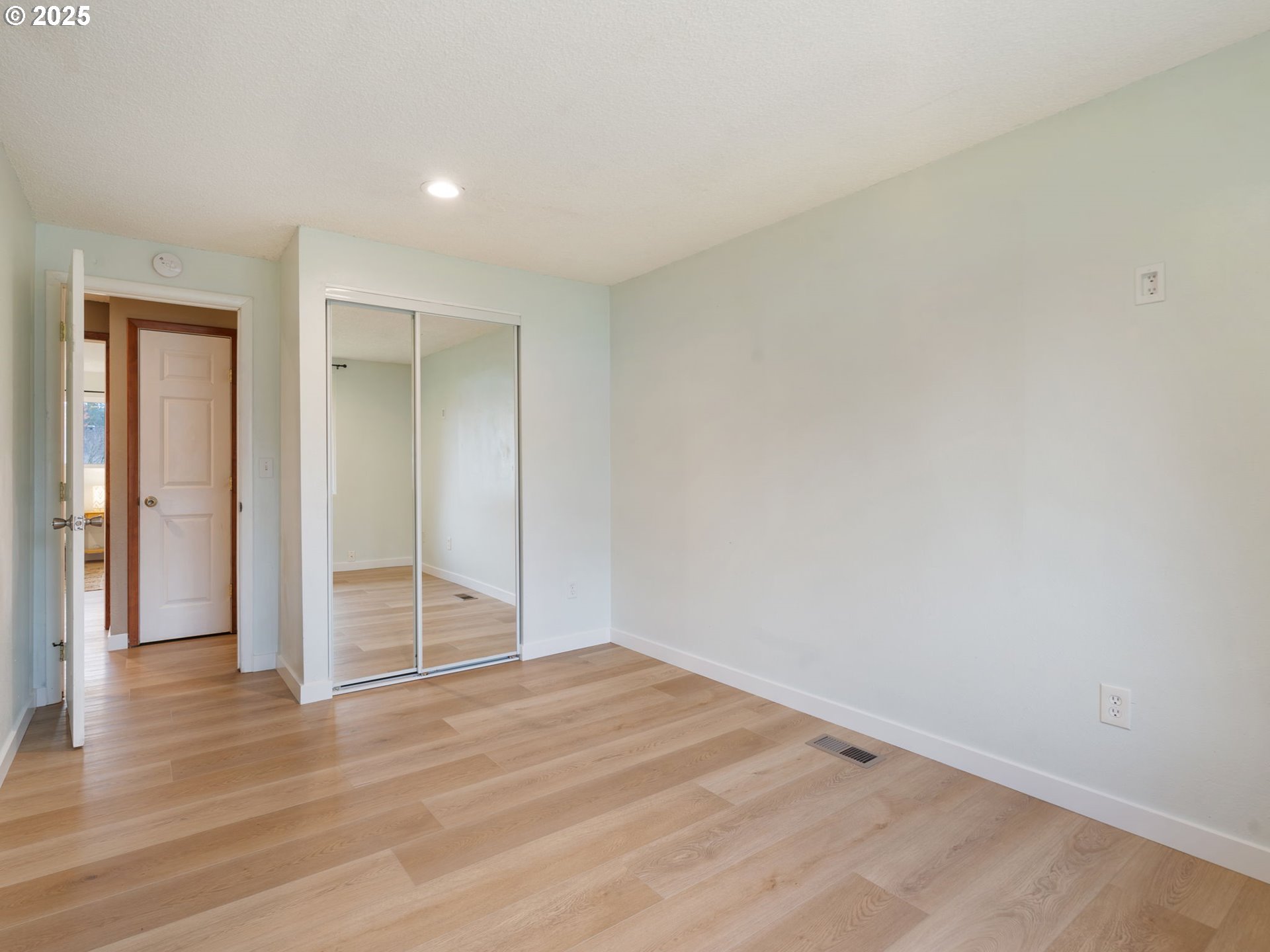 824 Southeast 207th Avenue Gresham, OR 97030 - Photo 31 of 47 wooden floor in an empty room