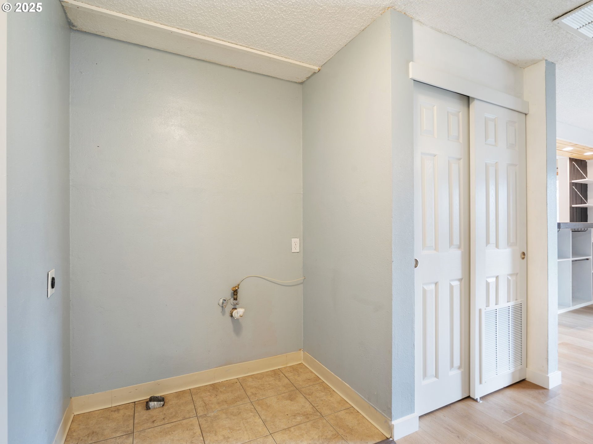 824 Southeast 207th Avenue Gresham, OR 97030 - Photo 40 of 47 a view of a room with racks on the wall