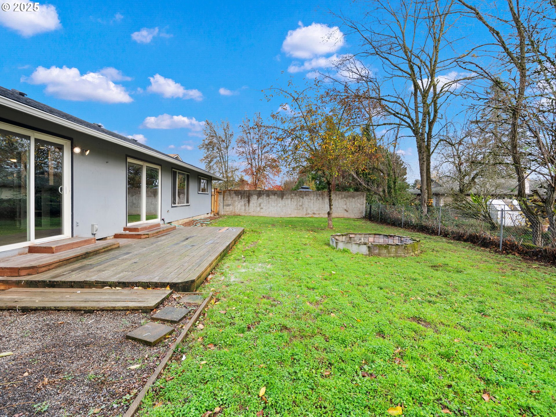 824 Southeast 207th Avenue Gresham, OR 97030 - Photo 44 of 47 a view of a backyard with a garden and trees