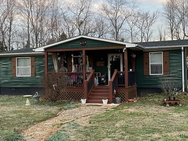 a front view of a house with a porch