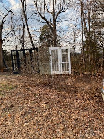 7359 Lewis Ford Road Gladys, VA 24554 - Photo 6 of 24 a backyard of a house with lots of green space