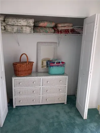 a view of a room with baby crib