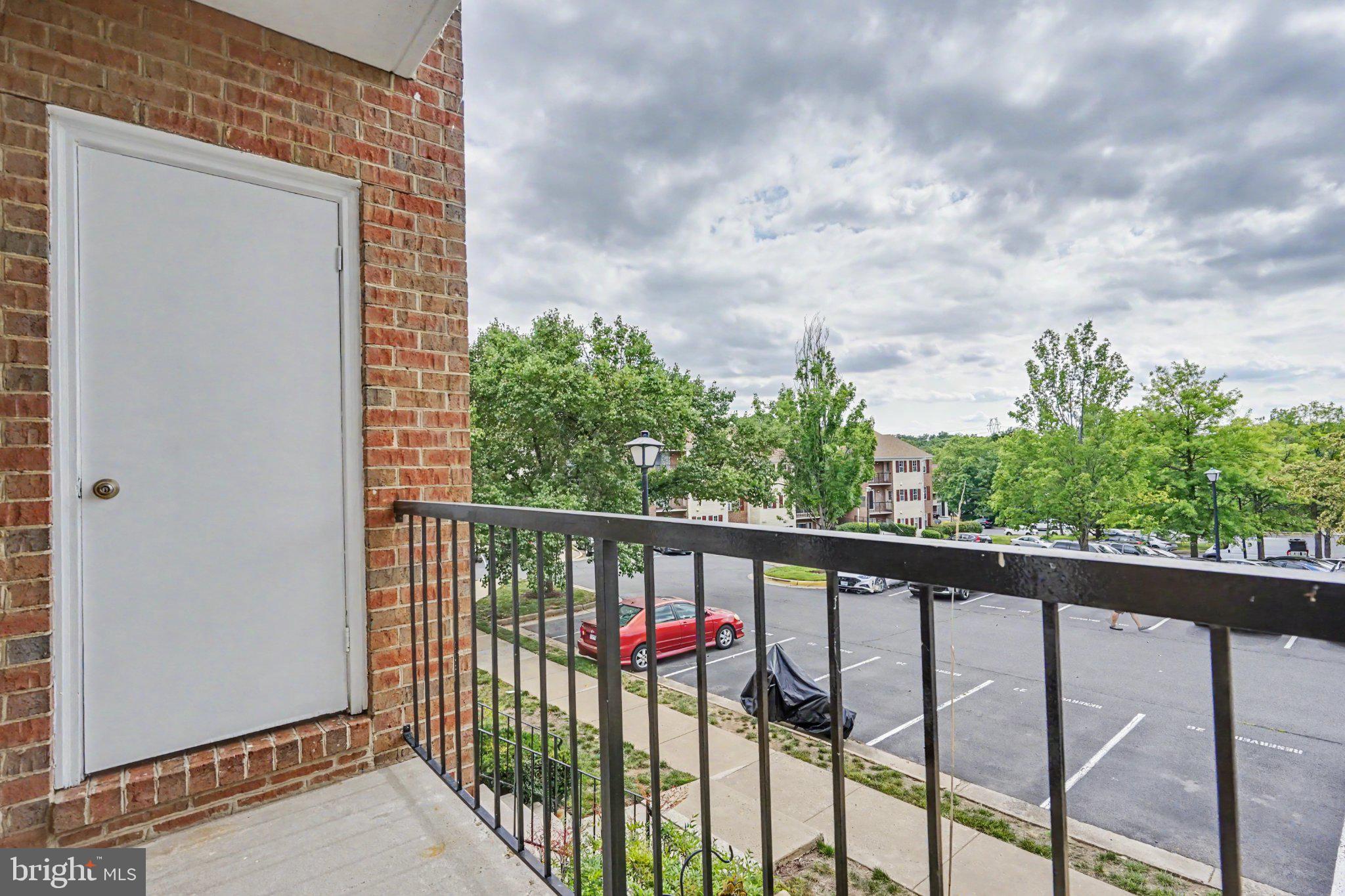 14800 Rydell Road, Unit 201 Centreville, VA 20121 - Photo 24 of 28 Charming balcony with serene views.