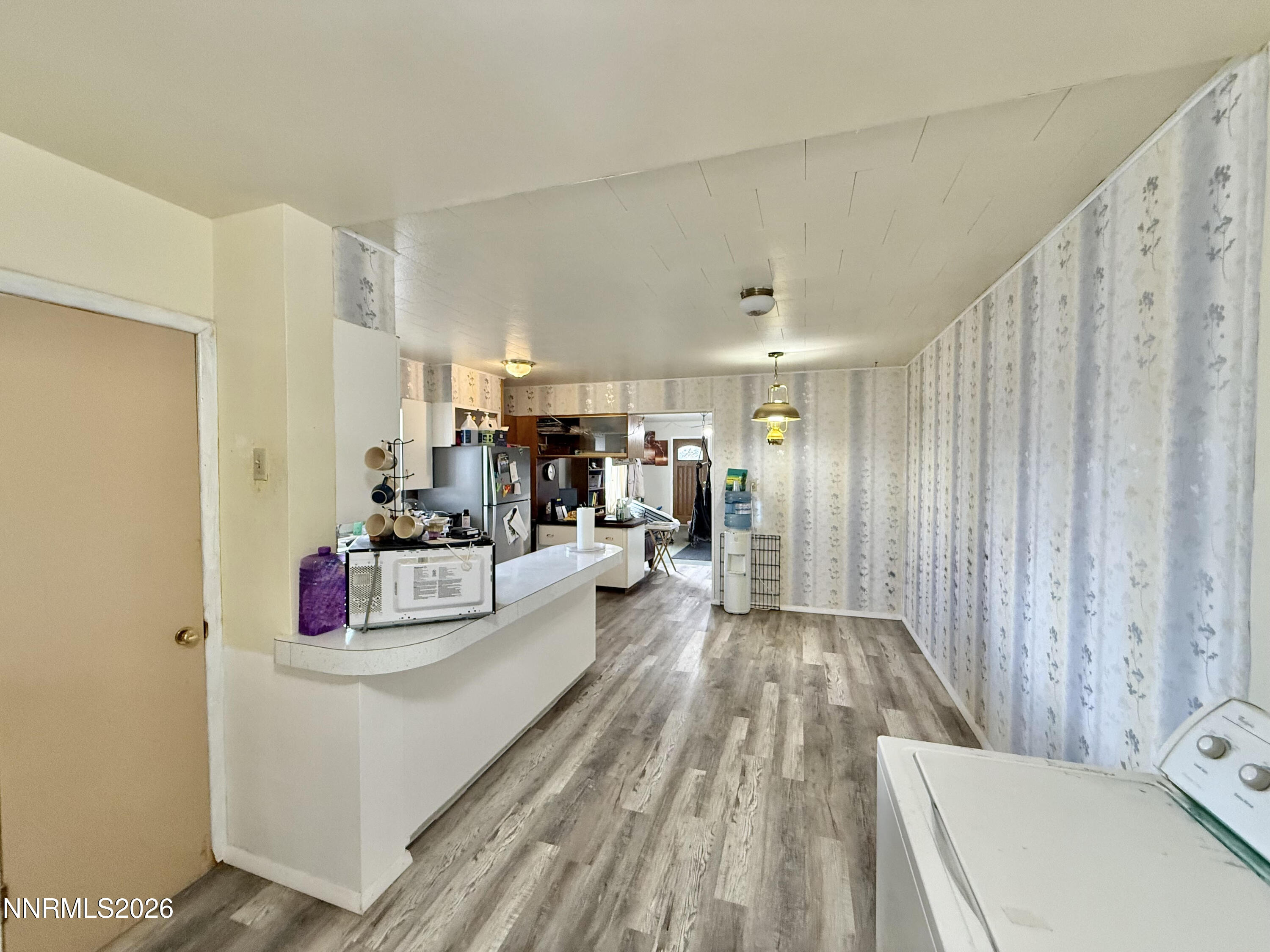 68 West 5th Street Battle Mountain, NV 89820 - Photo 14 of 20 a living room with furniture and a wooden floor