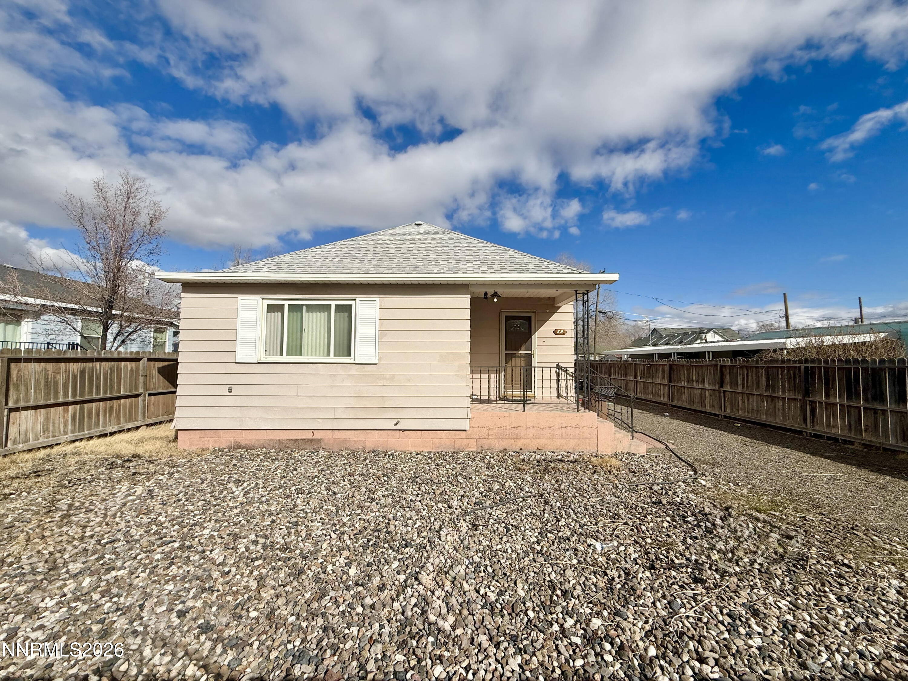 68 West 5th Street Battle Mountain, NV 89820 - Photo 2 of 20 a front view of a house with a yard