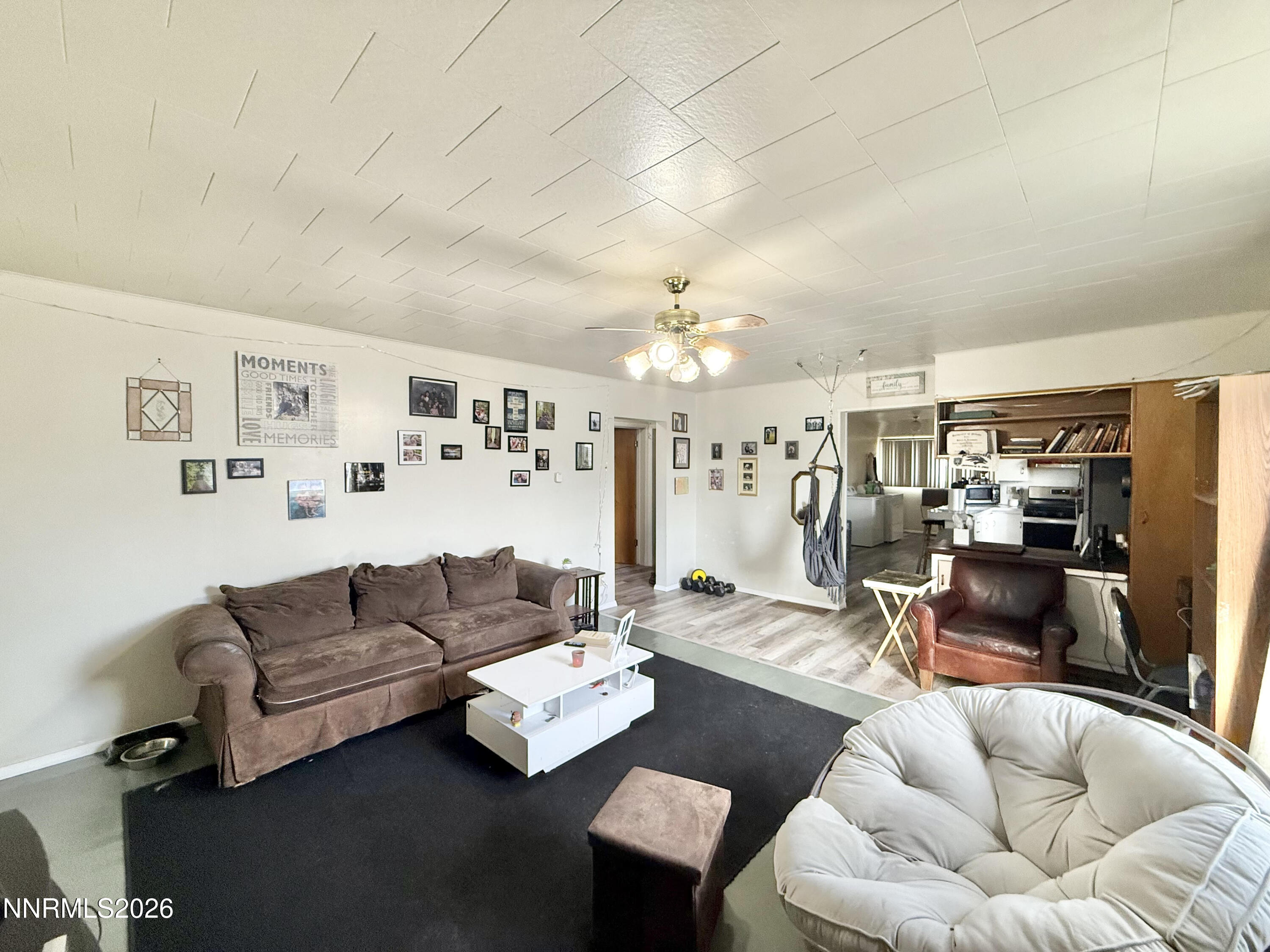 68 West 5th Street Battle Mountain, NV 89820 - Photo 4 of 20 a living room with furniture and a flat screen tv