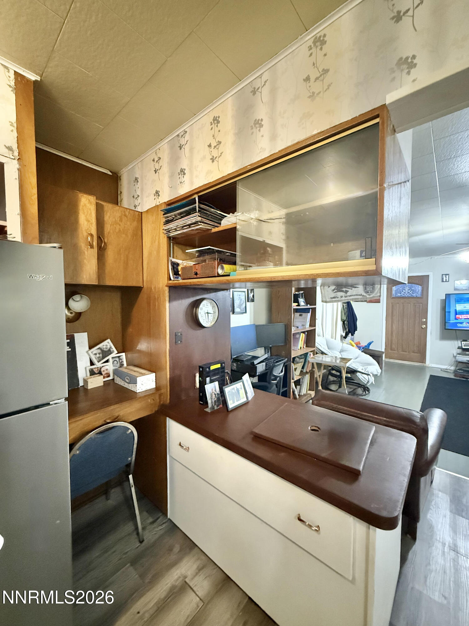 68 West 5th Street Battle Mountain, NV 89820 - Photo 7 of 20 a kitchen with a sink and a refrigerator
