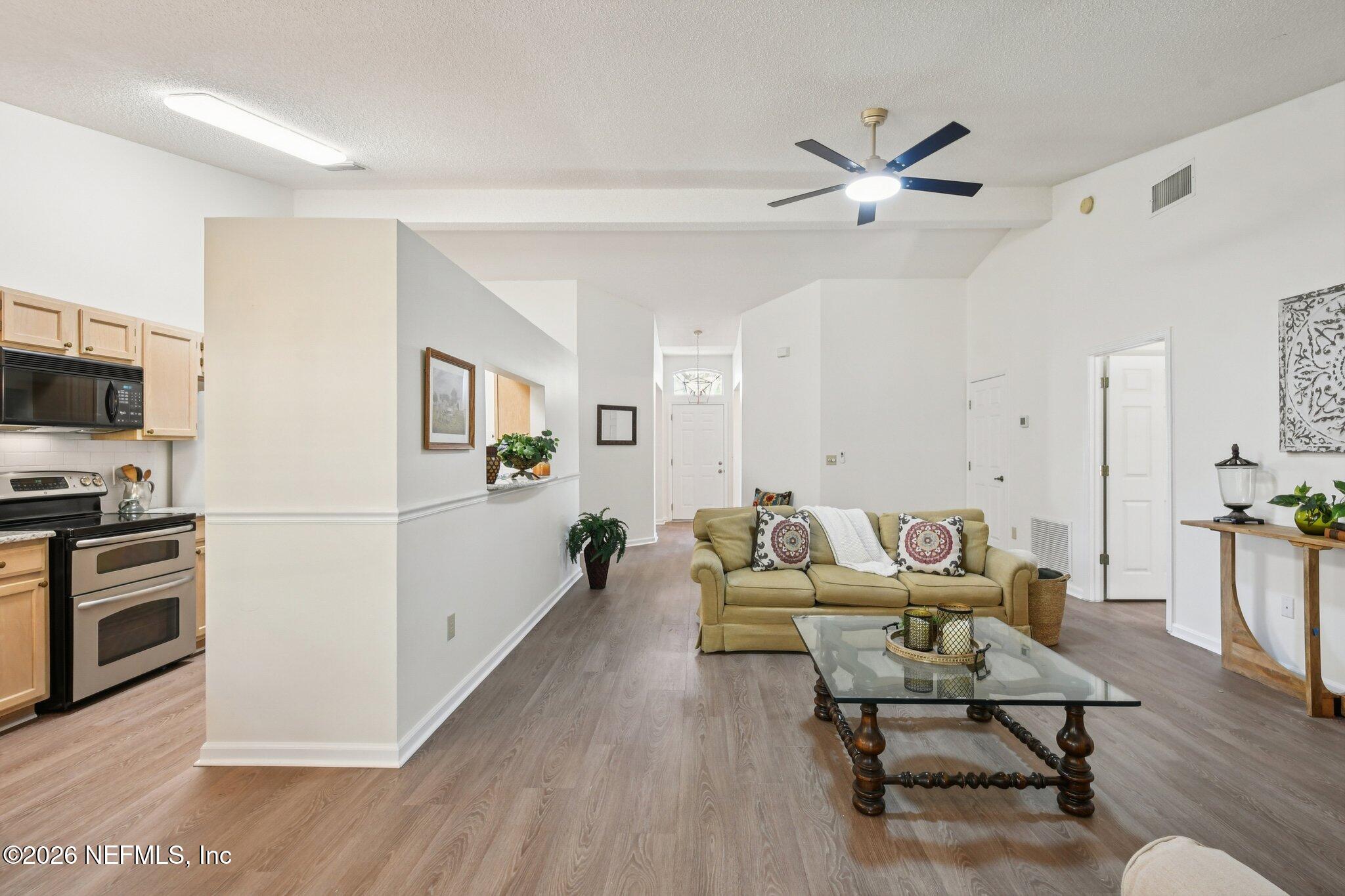 1532 Marsh Rabbit Way Fleming Island, FL 32003 - Photo 17 of 81 Living Room