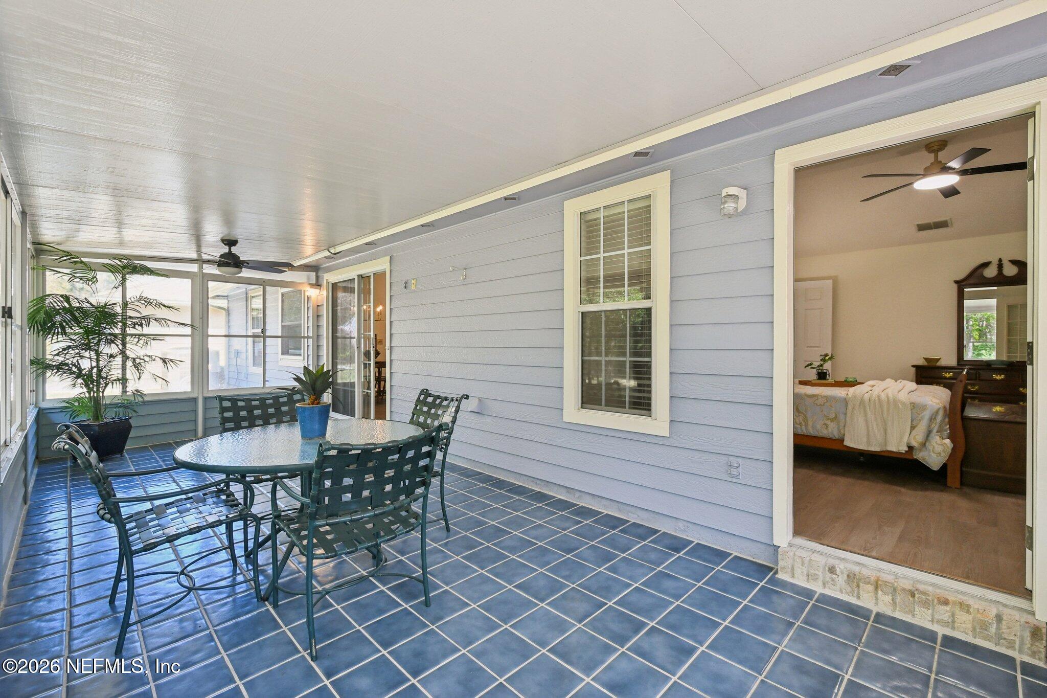 1532 Marsh Rabbit Way Fleming Island, FL 32003 - Photo 44 of 81 Enclosed Lanai