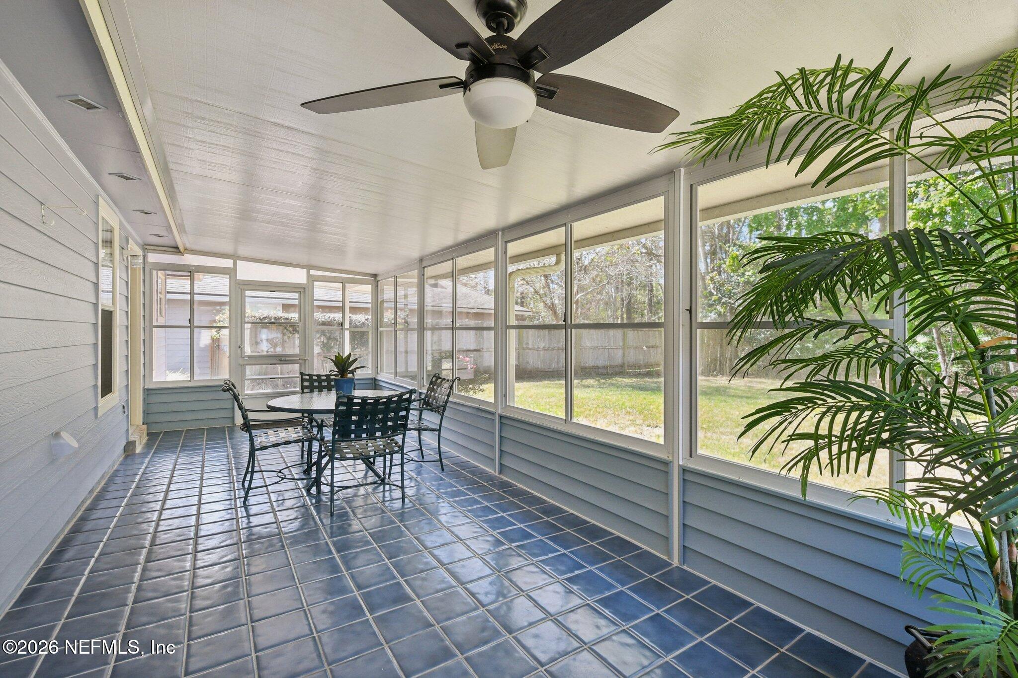 1532 Marsh Rabbit Way Fleming Island, FL 32003 - Photo 46 of 81 Enclosed Lanai