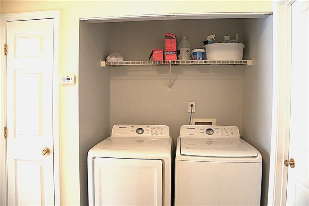 3767 Berkeley Crossing Duluth, GA 30096 - Photo 13 of 23 a utility room with dryer and washer