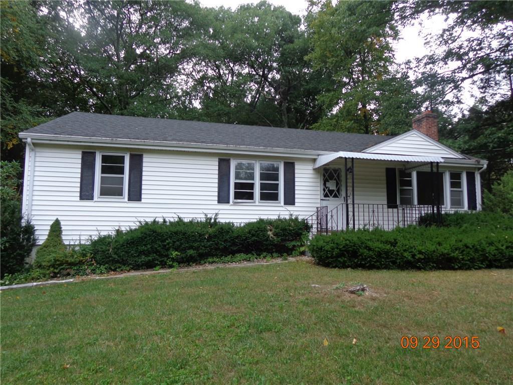 68 Sunnyridge Road Avon, CT 06001 - Photo 1 of 1 a front view of a house with a yard