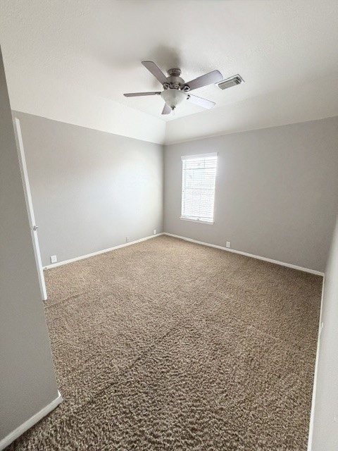 20030 Castlegreen Drive Spring, TX 77388 - Photo 20 of 23 an empty room with a ceiling fan and window