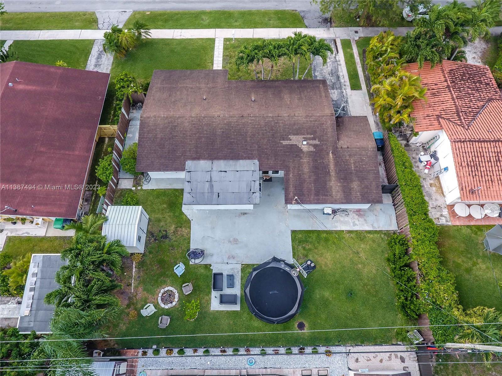 9275 Southwest 45th Street Miami, FL 33165 - Photo 6 of 23 an aerial view of a house with a yard
