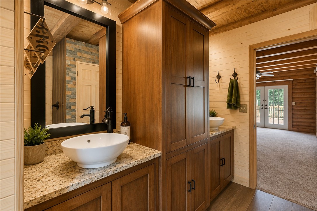 414 Devon Way Anderson, SC 29621 - Photo 18 of 50 Double vanity with vessel sinks provides ample space and rustic charm.