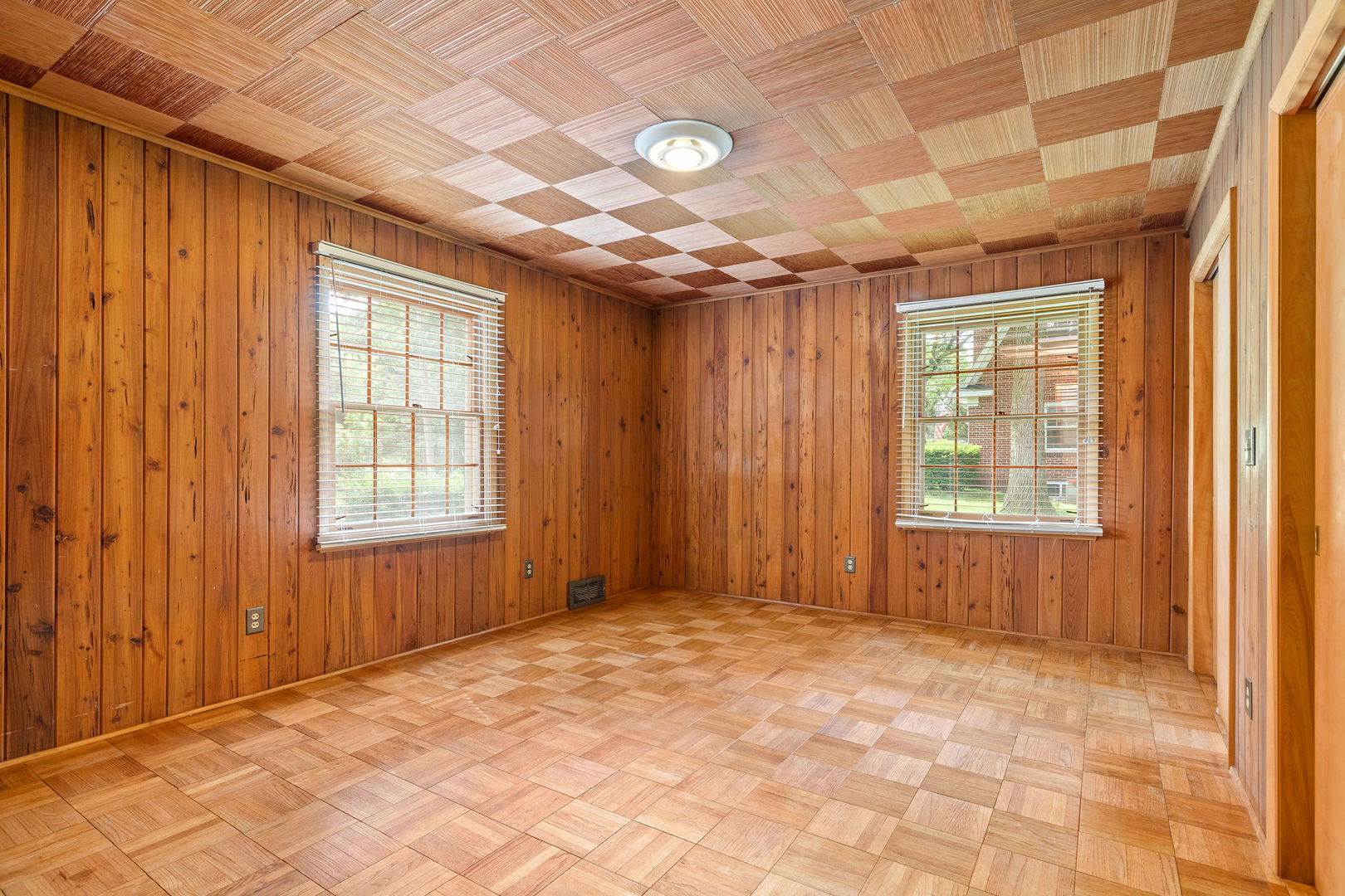 202 Sears Street Plano, IL 60545 - Photo 13 of 32 a view of an empty room with a window