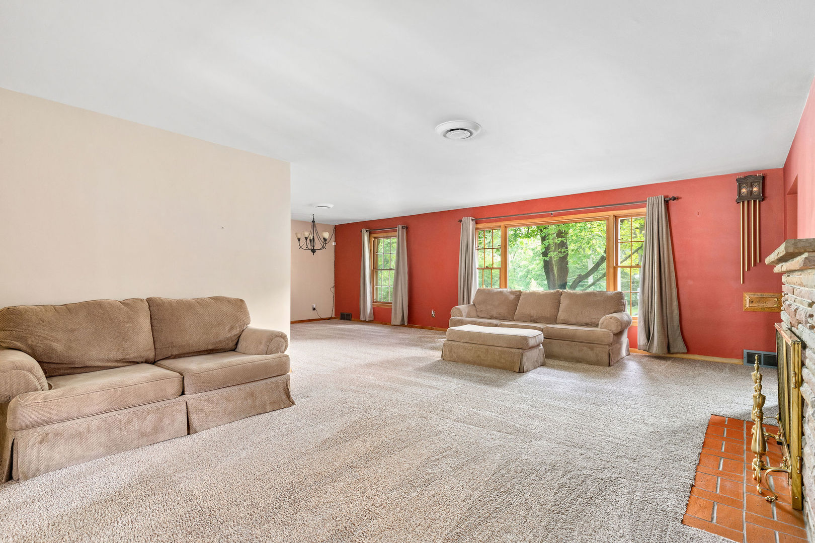 202 Sears Street Plano, IL 60545 - Photo 17 of 32 a living room with furniture and a large window