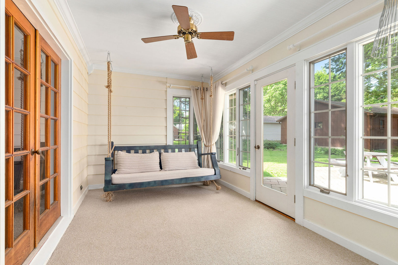 202 Sears Street Plano, IL 60545 - Photo 22 of 32 a living room with furniture and a large window