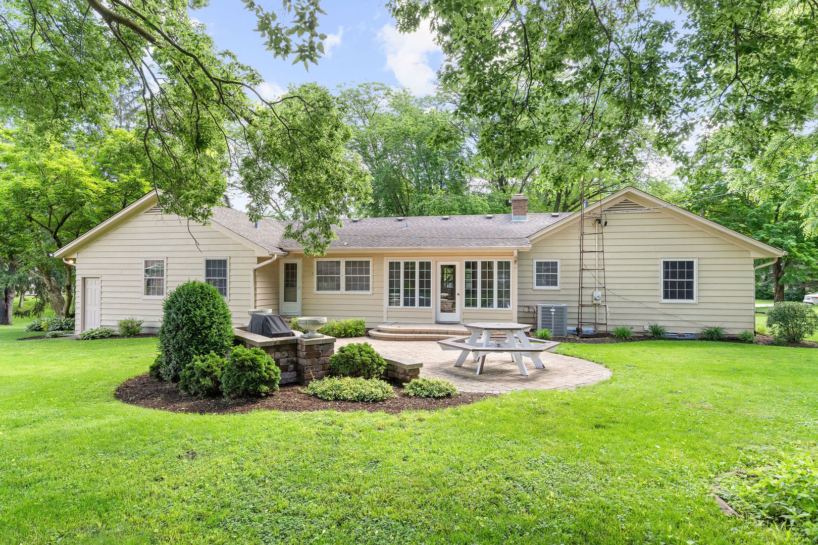 202 Sears Street Plano, IL 60545 - Photo 29 of 32 a front view of house with yard and green space