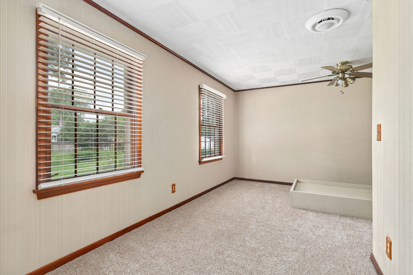 202 Sears Street Plano, IL 60545 - Photo 6 of 32 a view of an empty room with a window