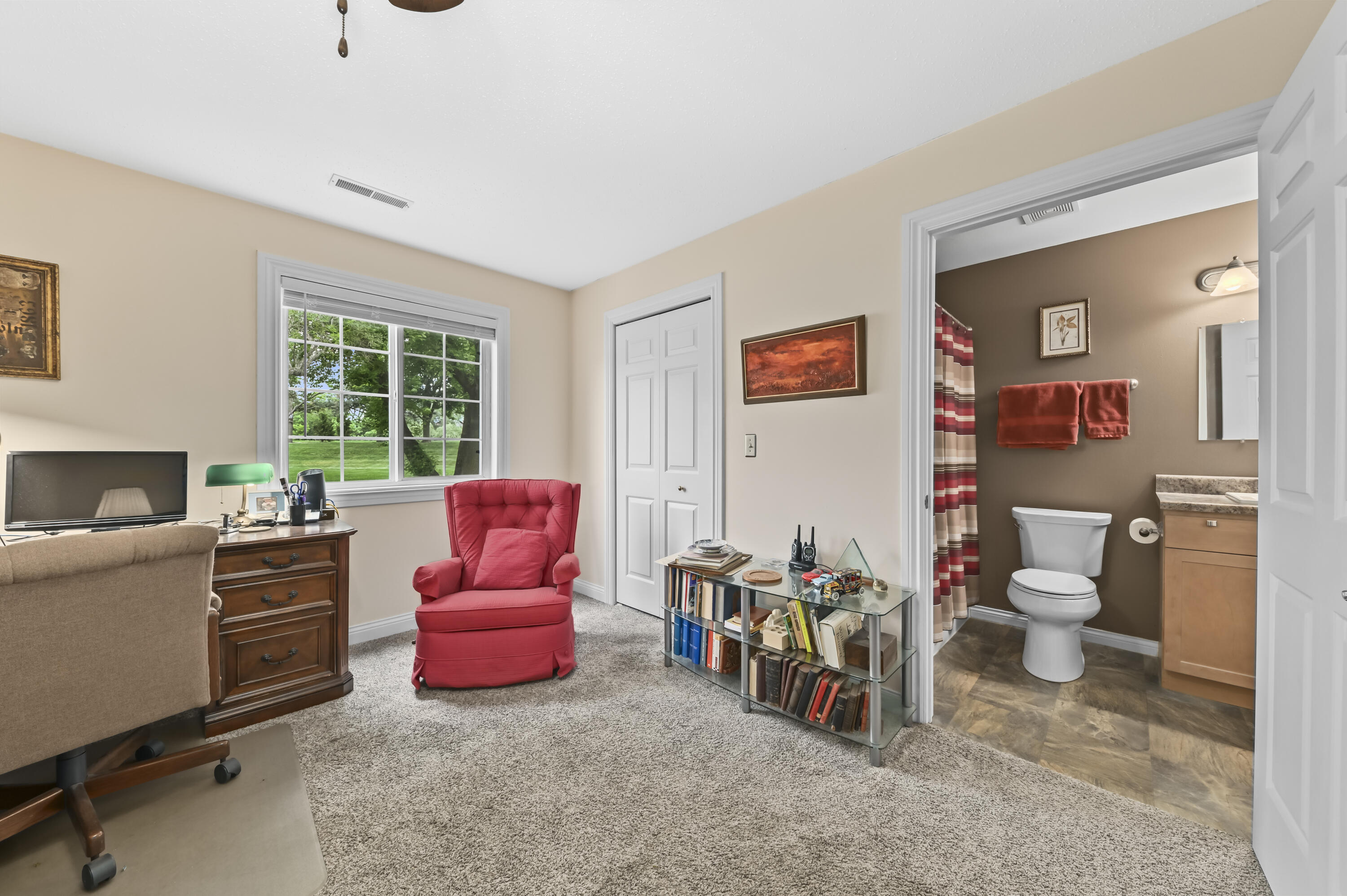 652 Pewaukee Road, Unit A Pewaukee, WI 53072 - Photo 12 of 30 Bedroom 2 with bath entry & closet