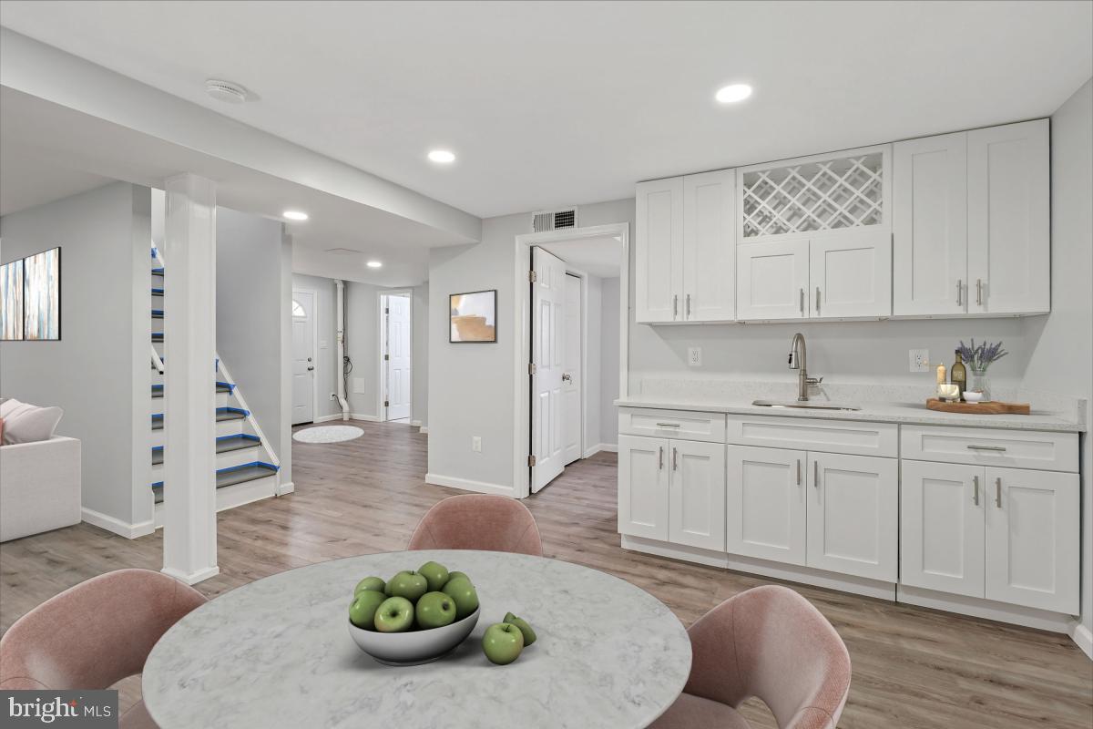 229 Hannes Street Silver Spring, MD 20901 - Photo 22 of 34 Wet bar in basement, virtually staged