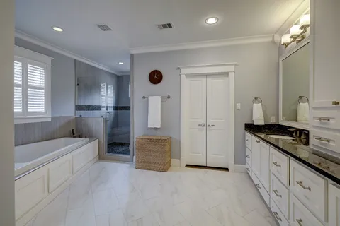 a view of a hallway with wooden floor and stairs