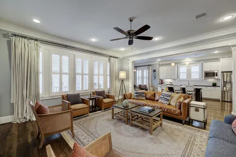 a front view of a house with a yard table and chairs