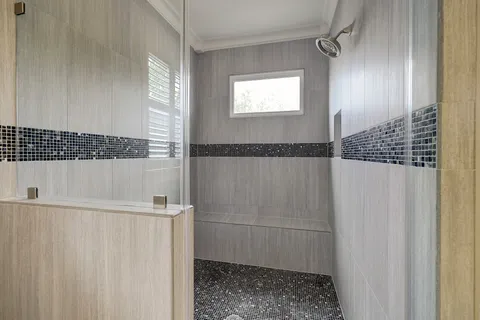 a bed room with a bed and a window