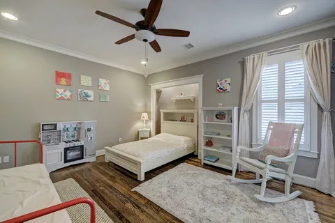 a bath tub sitting in a bathroom next to a window