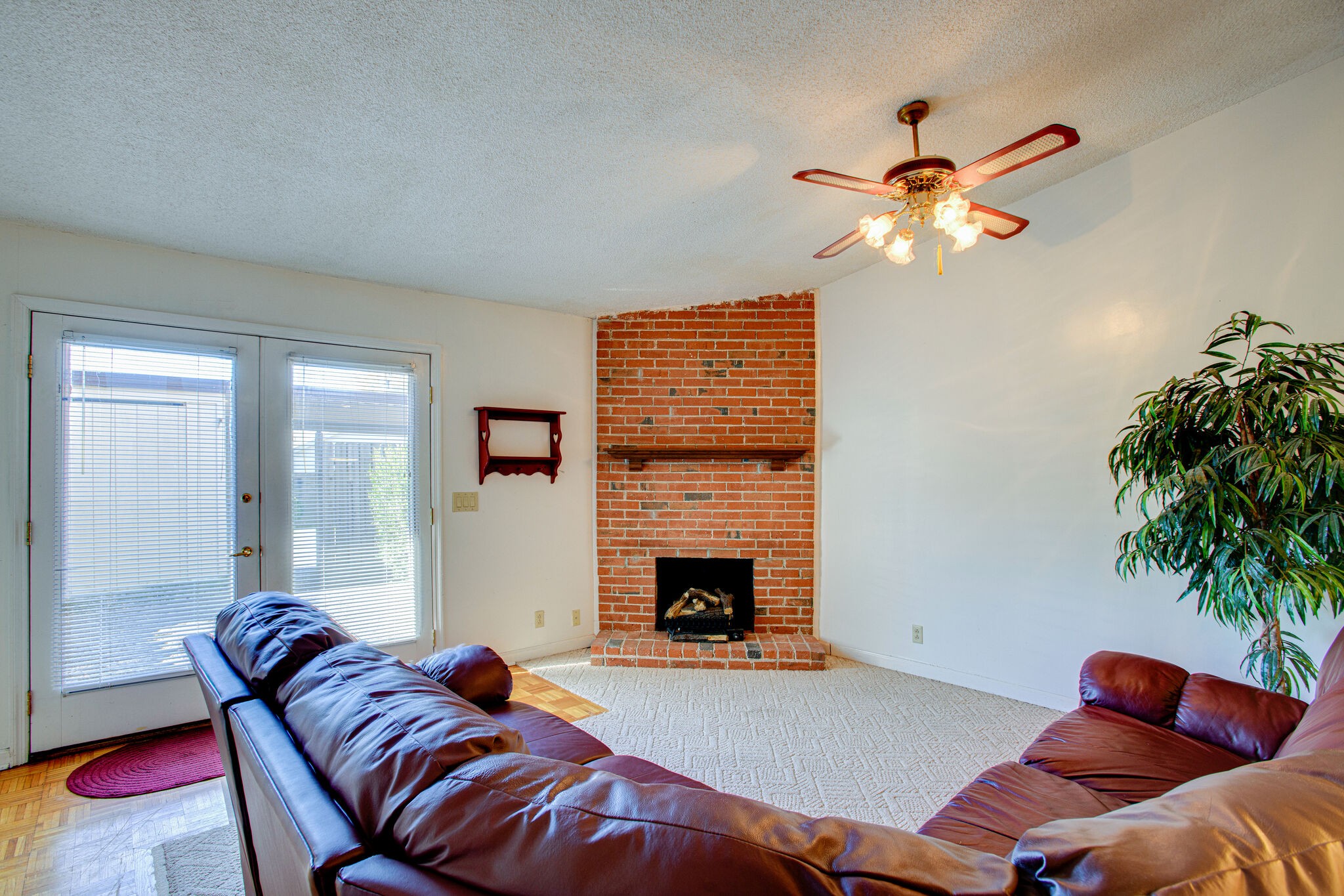 4001 Anderson Road, Unit J19 Nashville, TN 37217 - Photo 13 of 37 a living room with furniture and a fireplace