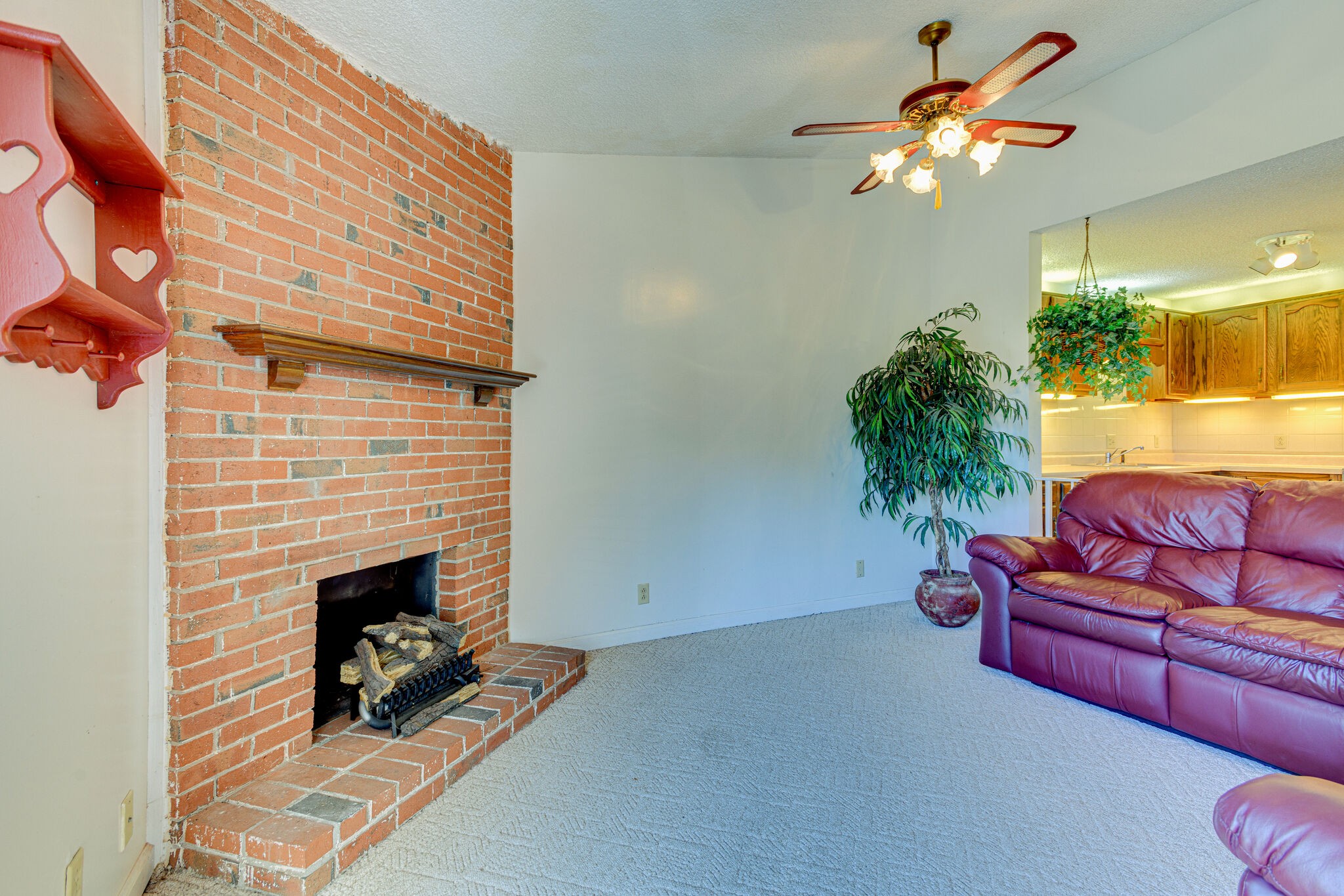 4001 Anderson Road, Unit J19 Nashville, TN 37217 - Photo 14 of 37 a living room with furniture and a fireplace