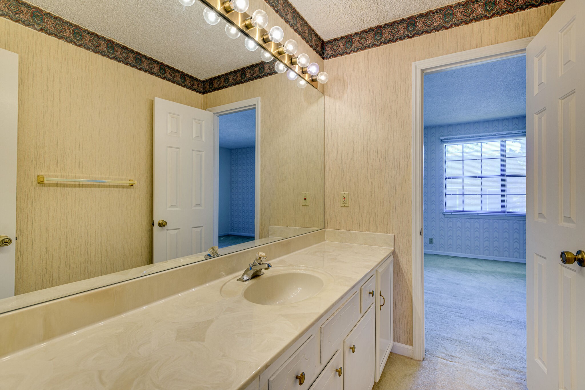 4001 Anderson Road, Unit J19 Nashville, TN 37217 - Photo 22 of 37 a bathroom with a sink double vanity and a mirror