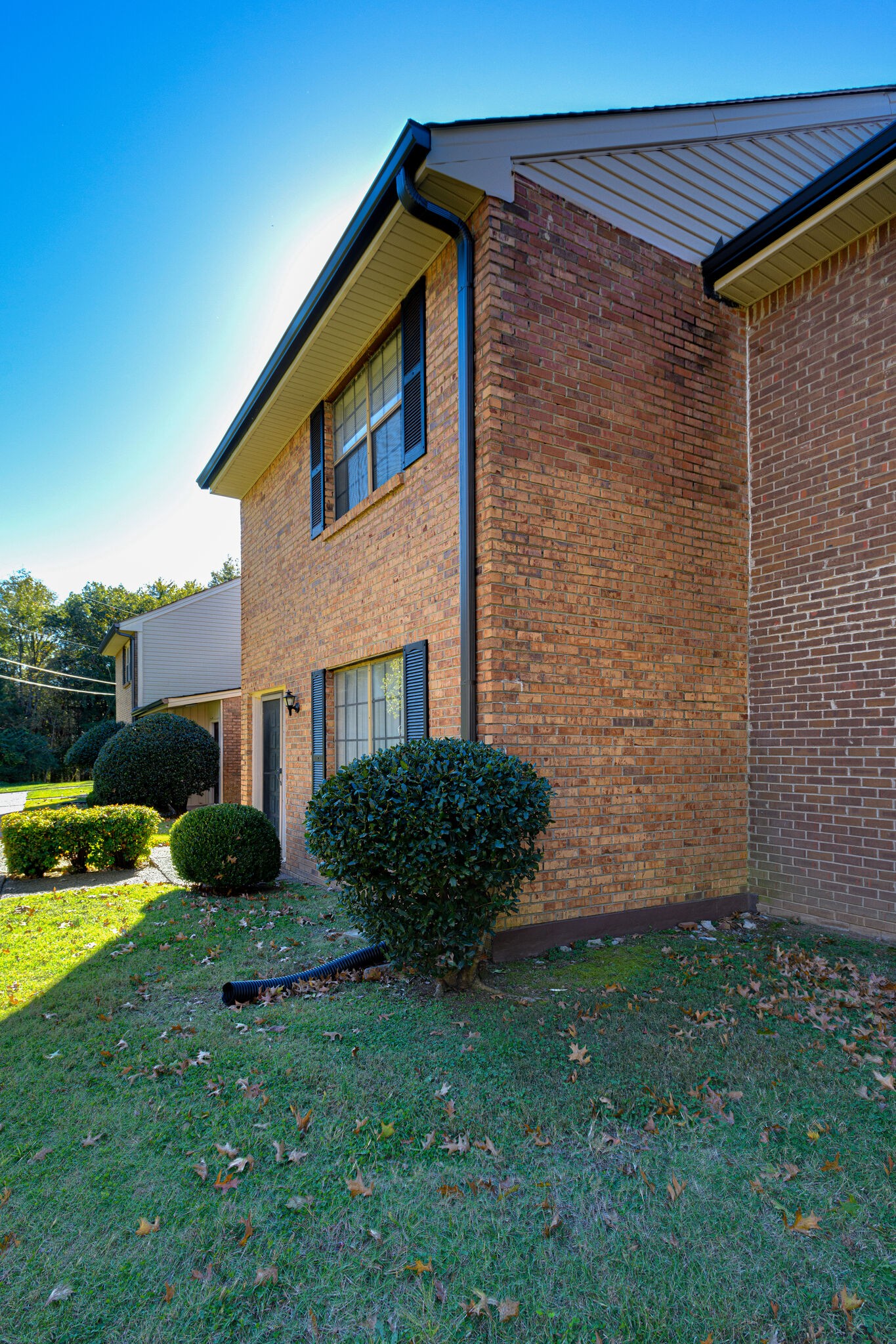 4001 Anderson Road, Unit J19 Nashville, TN 37217 - Photo 3 of 37 a view of dirt yard with a tree